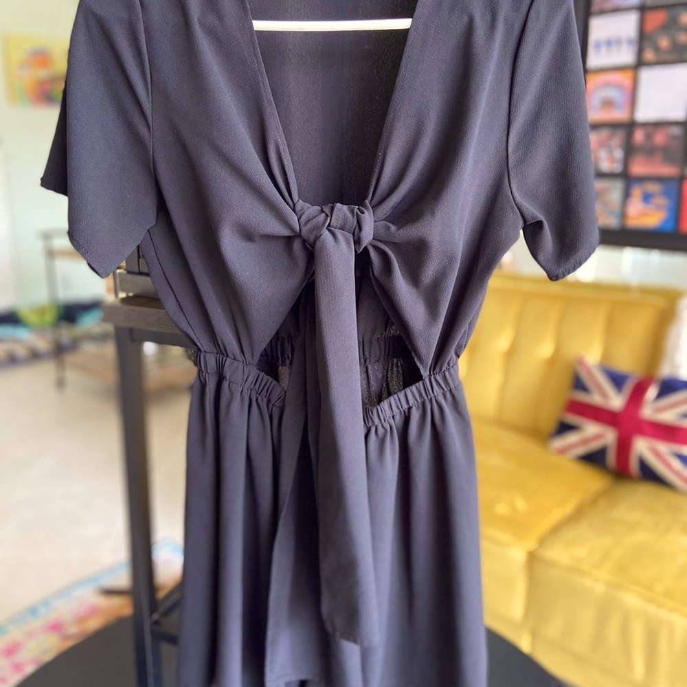 All black romper with front cut out